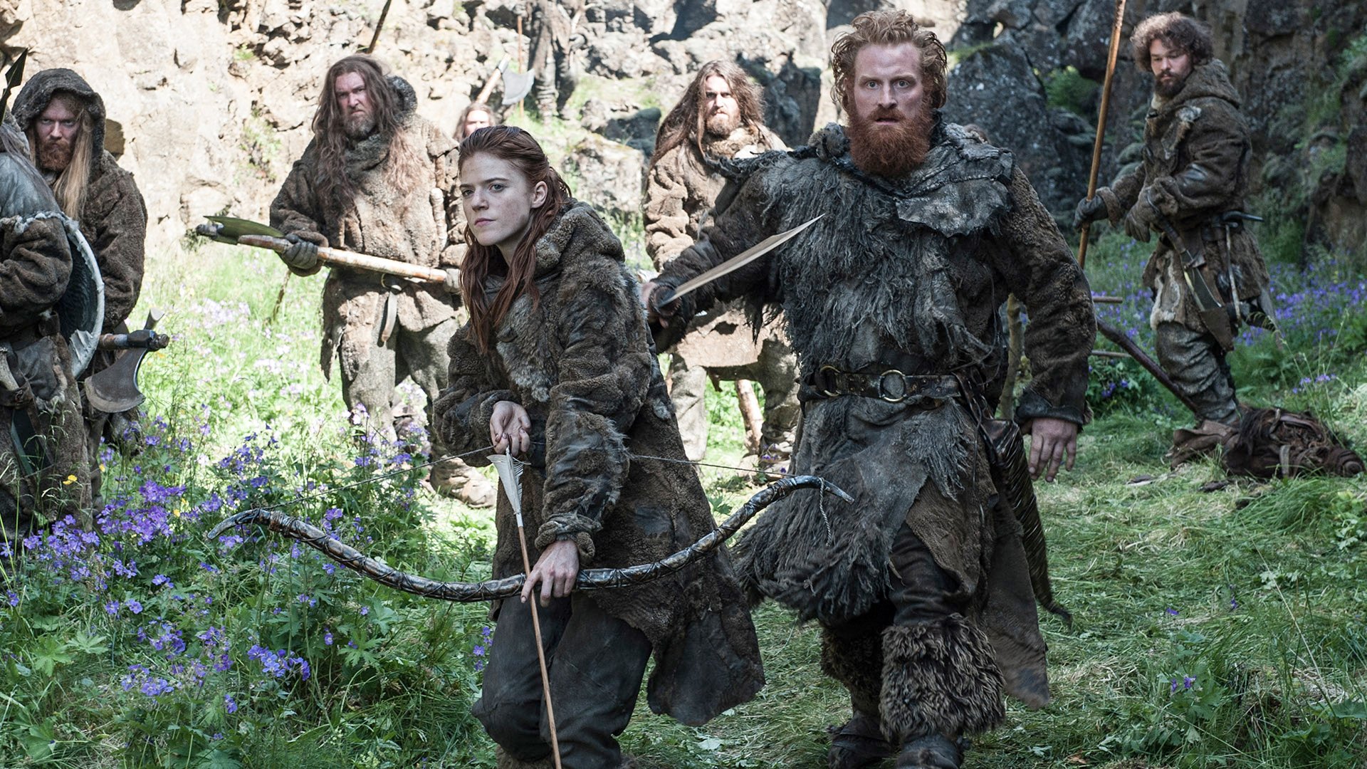 HD desktop wallpaper featuring Kristofer Hivju as Tormund Giantsbane and Rose Leslie as Ygritte from the TV show Game of Thrones in rugged wilderness attire.