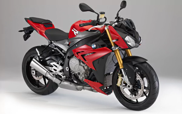 Red BMW S1000R sportbike on a gray backdrop, high-detail BMW vehicle image, 2K Quad HD PC desktop wallpaper background.