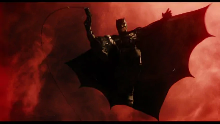 Ben Affleck as Batman in a dramatic red-hued scene from the 2017 Justice League movie, featured as an HD PC desktop wallpaper.