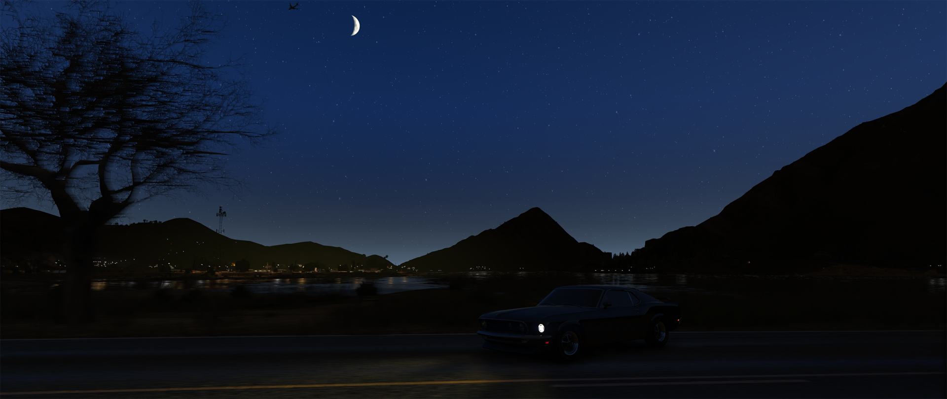 HD PC desktop wallpaper featuring a nighttime scene from the video game Grand Theft Auto V, showcasing a car driving along a road beneath a crescent moon and starry sky.