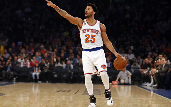 HD desktop wallpaper featuring a basketball player in New York Knicks attire, number 25, on the court during a game.