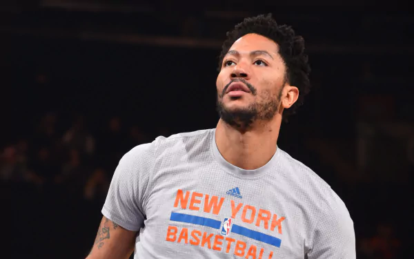 HD desktop wallpaper featuring Derrick Rose in a New York Basketball t-shirt.