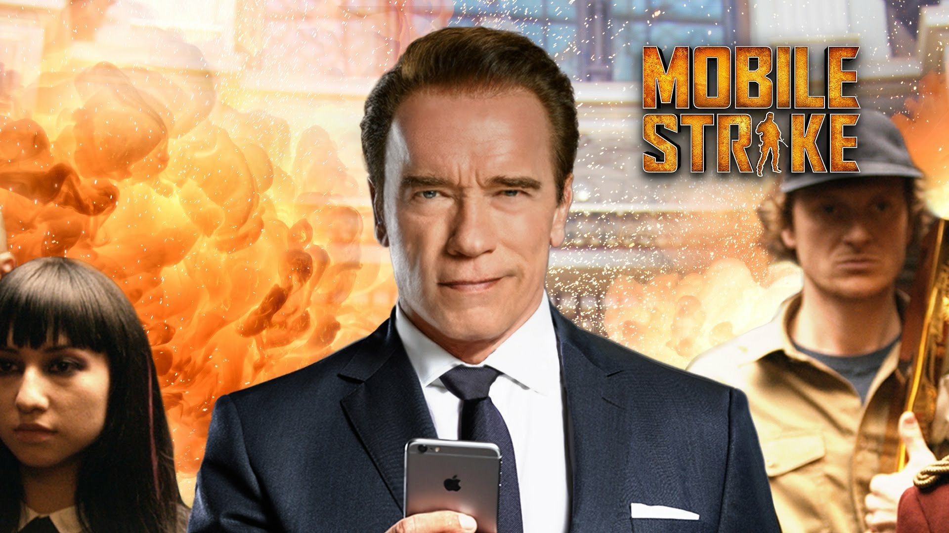 HD desktop wallpaper featuring Arnold Schwarzenegger in a suit holding a smartphone with the Mobile Strike logo and fiery explosion in the background.