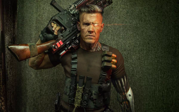 HD desktop wallpaper of Cable, portrayed by Josh Brolin, from the movie Deadpool 2, showcasing him in a futuristic warrior outfit with a large gun resting on his shoulder.