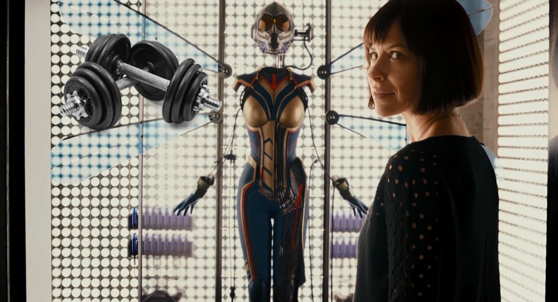 Evangeline Lilly from the Ant-Man movie stands next to the Wasp suit in this HD PC desktop wallpaper and background.