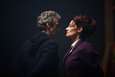 Peter Capaldi as the 12th Doctor in Doctor Who (2005) sharing an intense moment with a woman, captured in a 4K Ultra HD TV show wallpaper background.