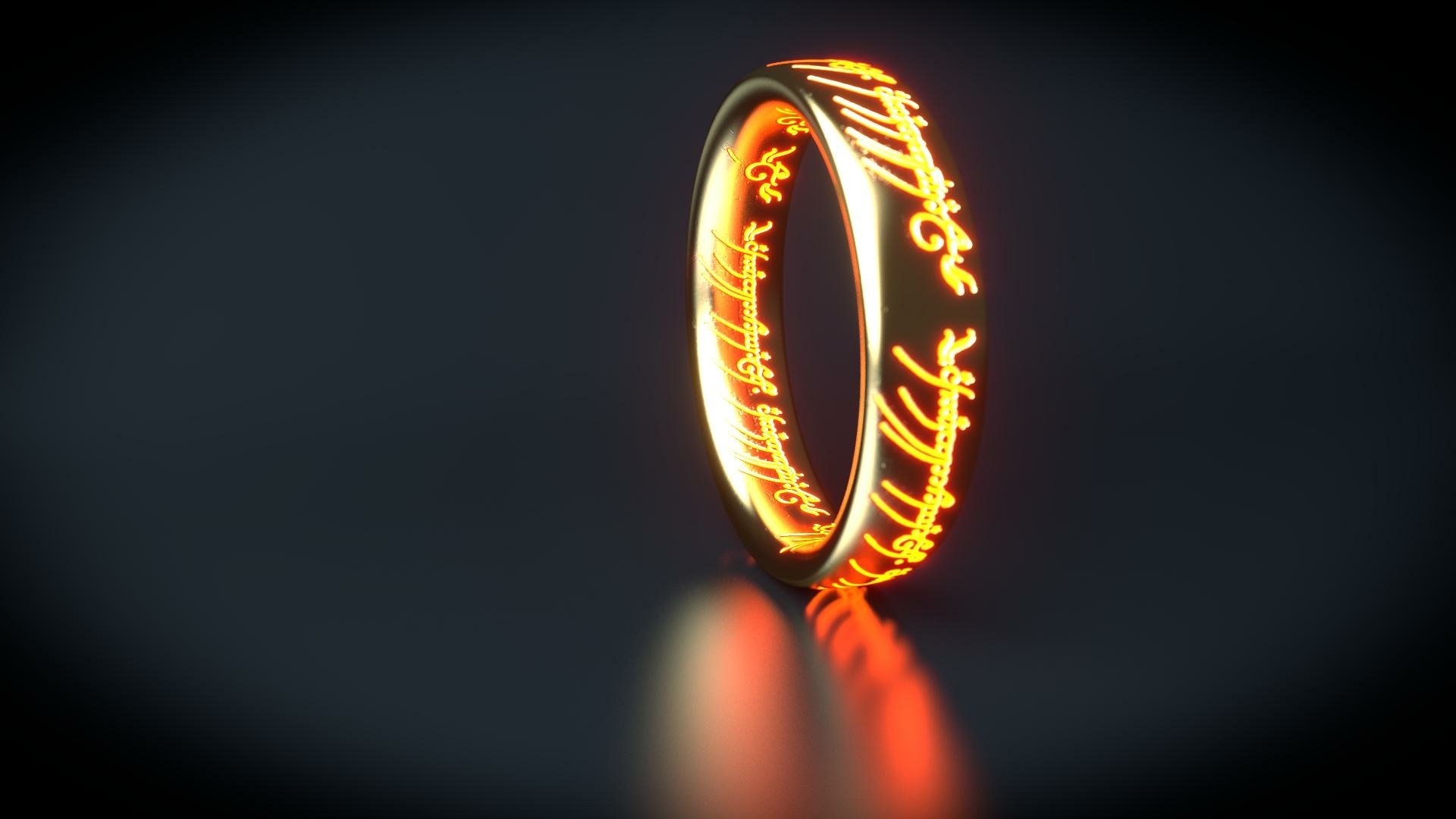 HD desktop wallpaper featuring the glowing One Ring from the movie The Lord of the Rings against a dark, reflective background.