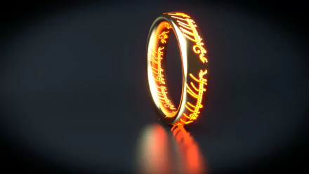 HD desktop wallpaper featuring the glowing One Ring from the movie The Lord of the Rings against a dark, reflective background.