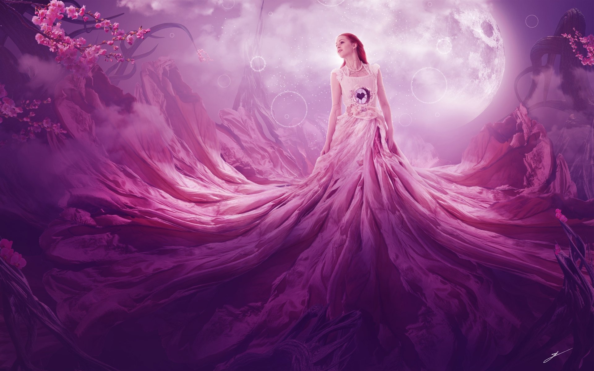 A red-haired woman in a flowing dress with a heart design stands among pink blossoms under a glowing moon in a fantasy 4K Ultra HD desktop wallpaper.