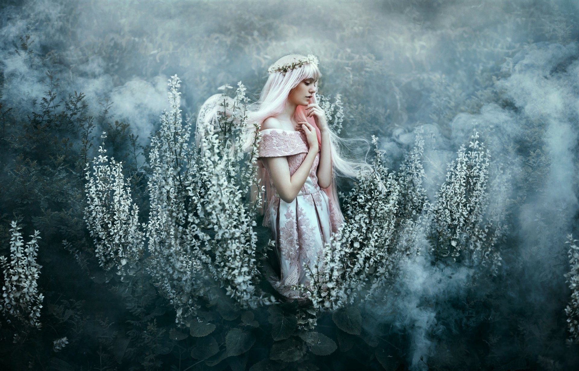 Artistic HD PC desktop wallpaper of a woman with pink hair and a pink dress amid flowering bushes and swirling smoke.