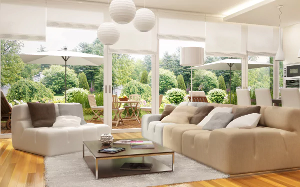 Modern living room featuring a beige sofa, white lounge chair, stylish furniture, and large windows overlooking a lush garden, captured in 4K Ultra HD desktop wallpaper quality.