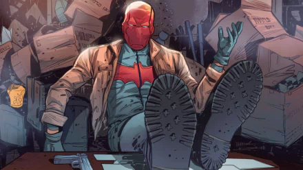 HD desktop wallpaper featuring DC Comics' Jason Todd, also known as the Red Hood, from Red Hood And The Outlaws, casually reclining with boots up, surrounded by boxes and a gun on the table.
