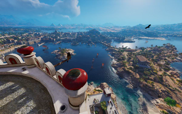 HD PC desktop wallpaper showcasing a panoramic view from Assassin's Creed Origins, featuring expansive landscapes, water, and distant pyramids under a bright blue sky.