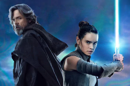 HD wallpaper featuring Daisy Ridley as Rey and Mark Hamill as Luke Skywalker from Star Wars: The Last Jedi, with Rey holding a glowing blue lightsaber against a dramatic background.
