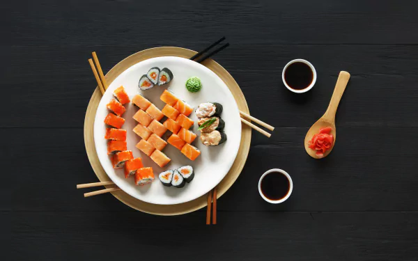 A vibrant still life of assorted sushi and seafood arranged on a white plate with soy sauce cups and chopsticks, captured in stunning 4K Ultra HD for a PC desktop background.