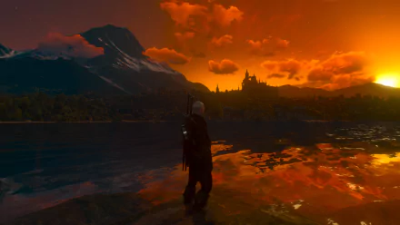 Geralt of Rivia stands by a reflective lake at sunset, with mountains and a distant castle in this HD PC desktop wallpaper from The Witcher 3: Wild Hunt.