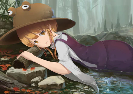 HD PC desktop wallpaper/background of Suwako Moriya (Anime, Touhou) reclining by a misty forest stream, wearing her frog hat and purple dress, gazing gently toward the viewer.
