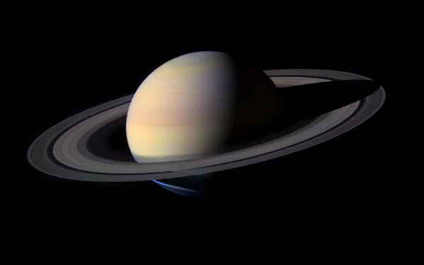 4K Ultra HD Sci-Fi wallpaper featuring a detailed view of Saturn with its iconic planetary rings against a black space background.