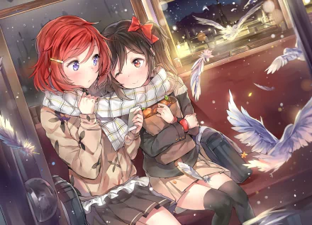 HD wallpaper featuring Maki Nishikino and Nico Yazawa from the anime Love Live! They are sitting together, sharing a scarf, with wintery scenery and white feathers floating around them.