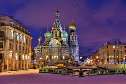 4K Ultra HD view of the Church of the Savior on Spilled Blood in Saint Petersburg, Russia, showcasing its intricate architecture and the surrounding city square at dusk.