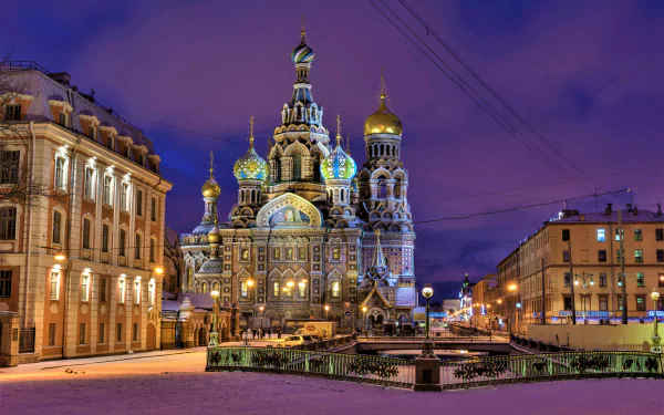4K Ultra HD view of the Church of the Savior on Spilled Blood in Saint Petersburg, Russia, showcasing its intricate architecture and the surrounding city square at dusk.