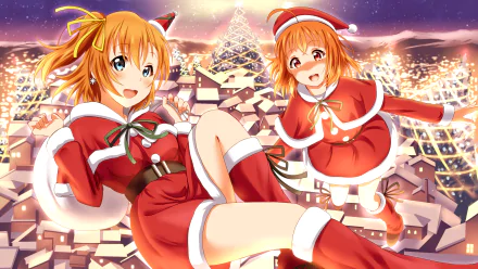 Festive 2K Quad HD PC wallpaper of Love Live! Sunshine!! characters Honoka Kousaka and Chika Takami in Santa outfits, smiling and posing above a snowy, glowing town.