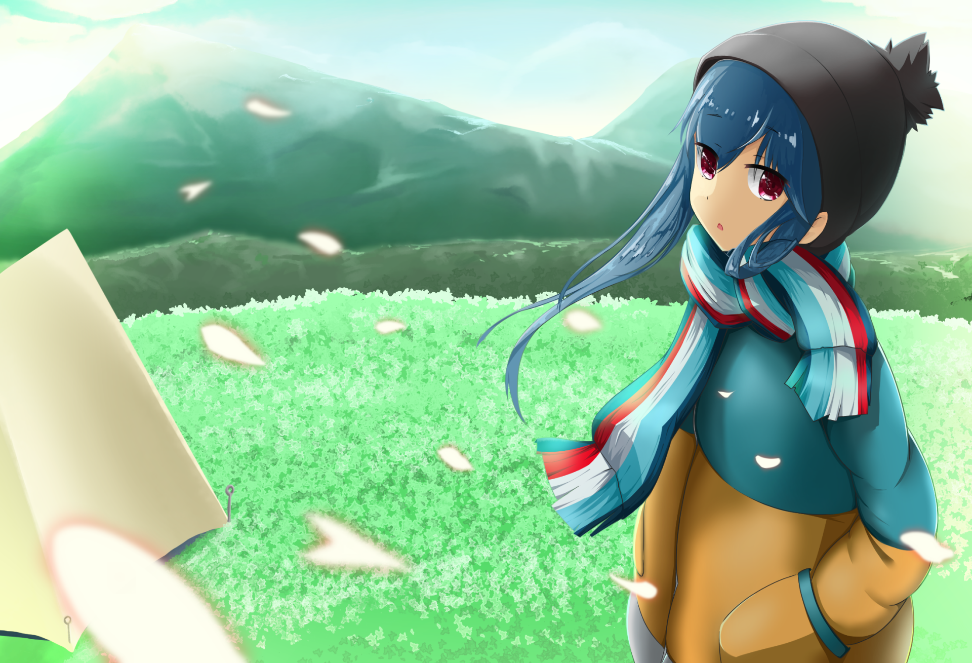 HD PC desktop wallpaper featuring Rin Shima from the anime Laid-Back Camp, standing in a grassy field with mountains and cherry blossom petals in the background.