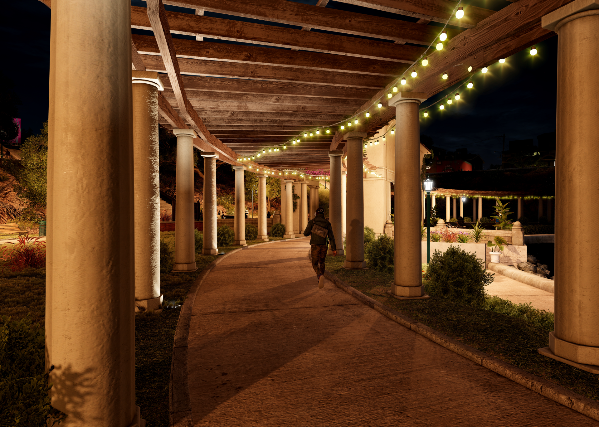 Watch Dogs 2 8K Ultra HD PC desktop wallpaper: night-time colonnade with string lights and a lone hooded figure walking beneath illuminated pillars.