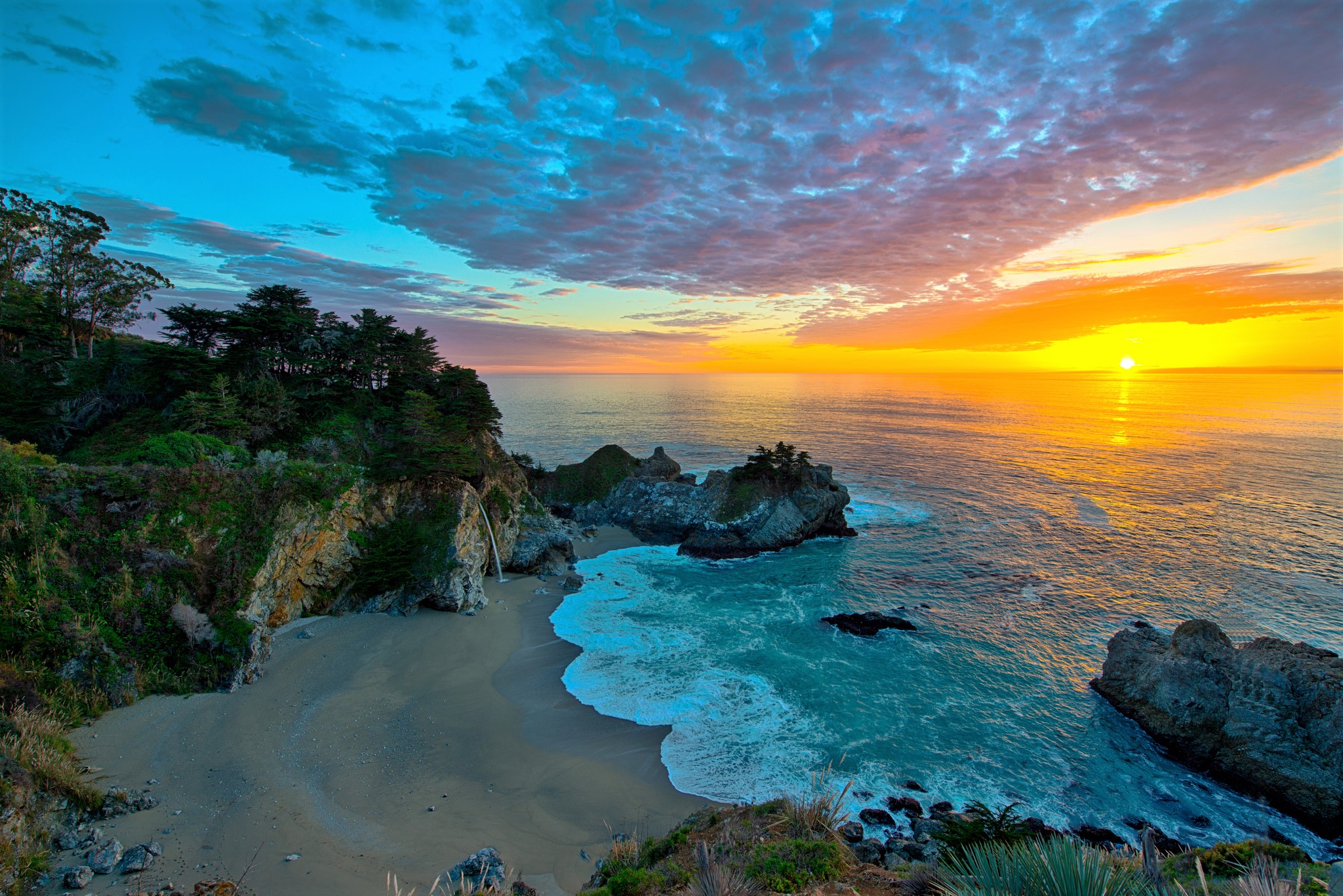 Sunset over McWay Falls in California by Bob Nastasi