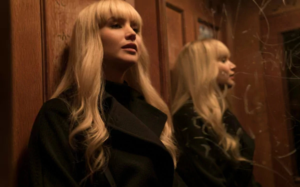 HD wallpaper featuring a scene from Red Sparrow with Jennifer Lawrence in a black coat, reflected in a mirror.
