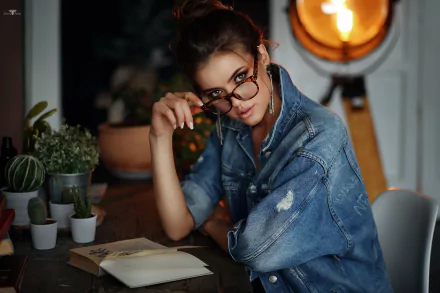 A brunette woman with brown eyes and glasses poses thoughtfully, captured in sharp focus with a blurred background, styled as an HD PC desktop wallpaper.