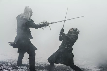 A dramatic scene from Game of Thrones featuring Jon Snow, played by Kit Harington, battling a White Walker in a snowy, misty landscape. This 4K Ultra HD wallpaper captures the tension of their encounter.