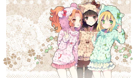 HD anime desktop wallpaper of three original smiling girls in fluffy hoodies with bow accents — blonde (green eyes), brown hair (brown eyes), orange hair (orange eyes); varied short and long hair.