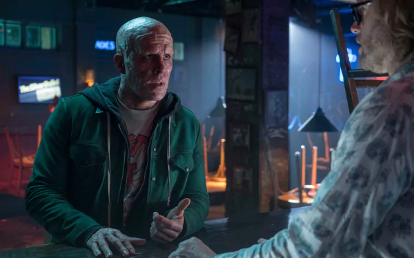 4K Ultra HD wallpaper featuring a scene from the movie Deadpool 2 with Ryan Reynolds in character as Deadpool.