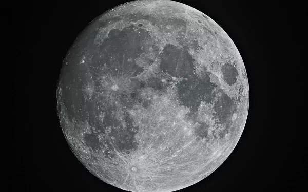 5K Ultra HD PC desktop wallpaper showing a detailed close-up of the full moon against a black sky, a nature-inspired high-resolution background.