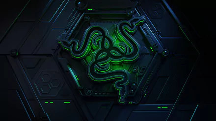HD desktop wallpaper showcasing a Razer logo with a sleek, futuristic design featuring glowing green accents on a dark, technology-themed background.
