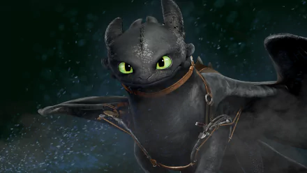 HD PC desktop wallpaper featuring Toothless from How to Train Your Dragon 2, showcasing the dragon's bright green eyes and black scales against a dark, misty background.