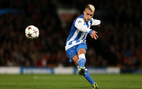 4K Ultra HD image of French soccer player Antoine Griezmann in action on the field, captured during a high-intensity match.