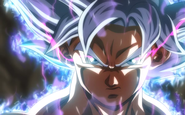 HD wallpaper of Goku from Dragon Ball Super, showcasing his Ultra Instinct form with intense energy aura, sharp focus, and glowing white hair.
