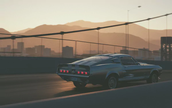 4K Ultra HD PC desktop wallpaper of a Ford Mustang GT500 crossing a bridge at sunset in The Crew 2 video game.