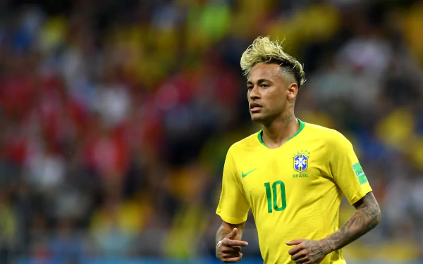 HD desktop wallpaper featuring Neymar in Brazil's number 10 soccer jersey on the field.