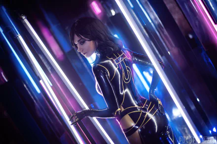 A high-definition desktop wallpaper features a woman cosplaying Miranda Lawson from Mass Effect, illuminated by colorful neon lights in a futuristic background.