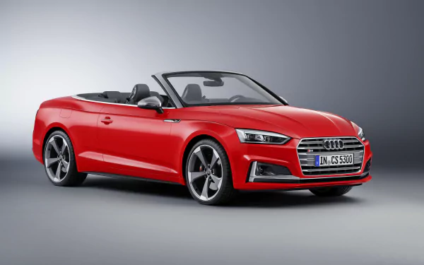 Red Audi S5 cabriolet sports car showcased in a sleek 4K Ultra HD PC desktop wallpaper, highlighting its modern design and luxury appeal.