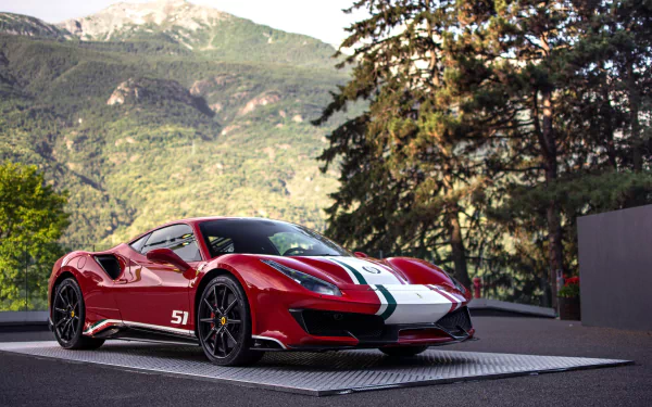 A red Ferrari 488 supercar with racing stripes parked outdoors, set against a mountainous landscape, captured in stunning 4K Ultra HD quality.