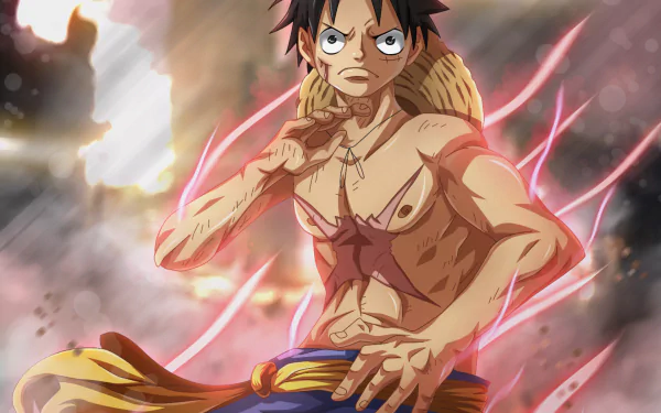 HD wallpaper featuring Monkey D. Luffy from the anime One Piece, showcasing his muscular torso with a prominent scar. Luffy is depicted with a determined expression amidst a dynamic and fiery background.