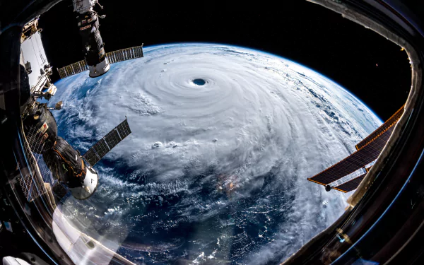 4K Ultra HD view from a space station shows a massive cyclone swirling over Earth, captured by NASA’s satellite in space.