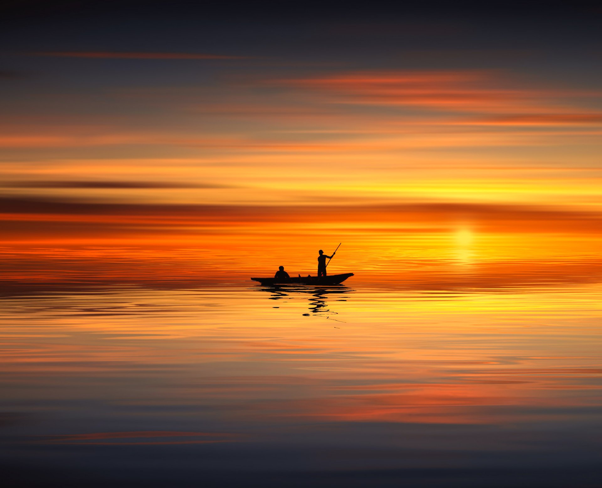 Two people on a boat are silhouetted against a vibrant sunset, their reflection shimmering on calm water. This high-definition photo makes an eye-catching wallpaper background.