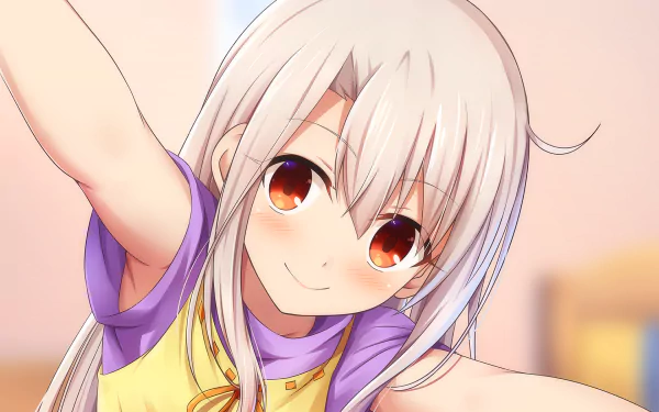HD desktop wallpaper featuring Illyasviel Von Einzbern from the anime Fate/kaleid liner Prisma Illya. The character is smiling, showcasing vibrant colors and detailed artwork.