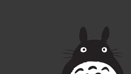 HD desktop wallpaper featuring the iconic black and white Totoro character from Studio Ghibli's anime My Neighbor Totoro against a dark background.