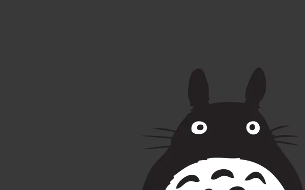 HD desktop wallpaper featuring the iconic black and white Totoro character from Studio Ghibli's anime My Neighbor Totoro against a dark background.
